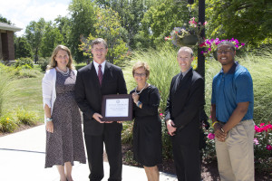 White's Campus Pastor Amy Cornell, CEO Dee Gibson, Indiana Secretary of State Connie Lawson, White's Board President Eric Dale and White's former student Lucas Wallace